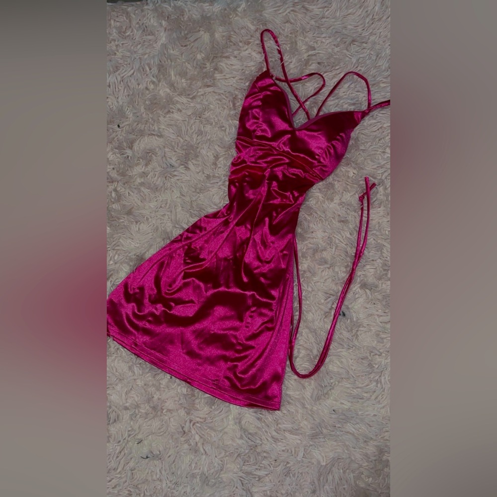 Perfect!! Barbie pink, dress with adjustable string back.
